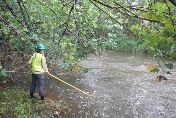 Rachael collecting stream water sample